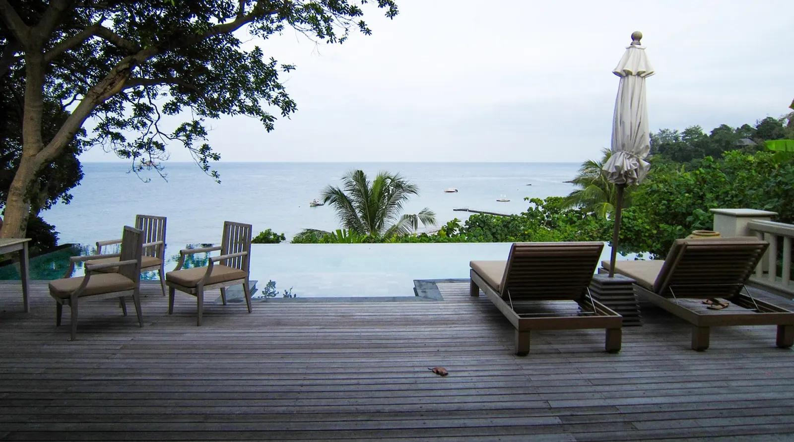 Villa terrace with infinity pool overlooking the Andaman Sea, Phuket